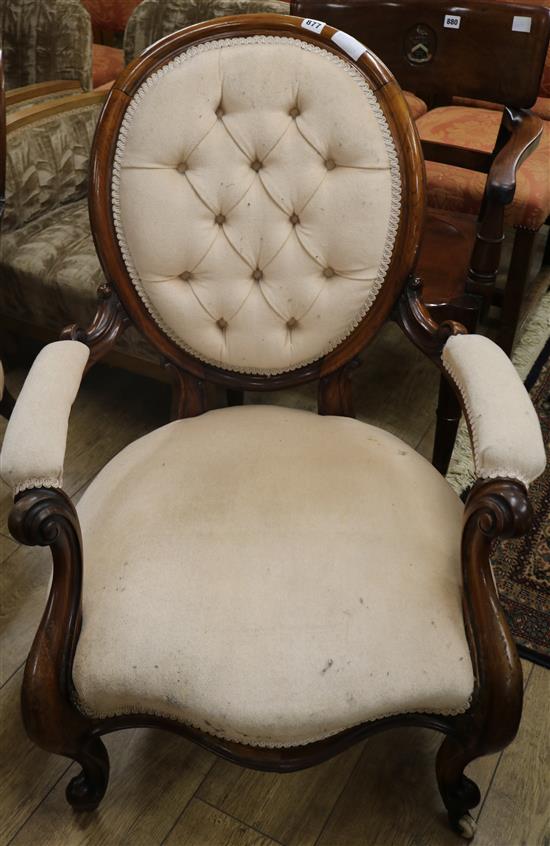 An Edwardian marquetry inlaid elbow chair